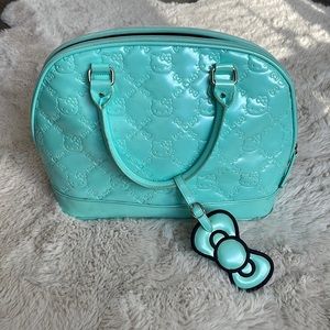 Hello Kitty x Loungefly turquoise medium bowler bag